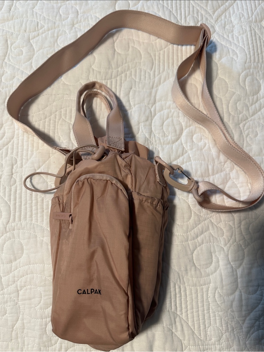 Calpak Blush Crossbody Bottle Bag